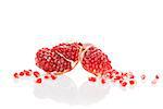 Pomegranate pieces and core isolated on white background. Healthy fruit eating background, contemporary minimal sparse style.
