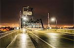 Industrial bridge over Puget Sound at night, Tacoma, Washington State, USA