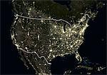 United States at night in 2012. This satellite image with country borders shows urban and industrial lights.