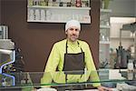 Waiter working at cafe