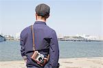 Rear view of male tourist looking at view of river, Seoul, South Korea