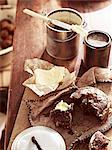 Rustic table with billycan bun and butter