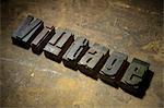 Letterpress letters spelling the word Vintage