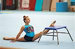 Young gymnast practising moves