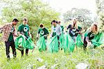 Environmentalist volunteers picking up trash