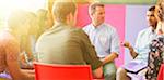 Man speaking in group therapy session