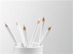 White pencils in white cup still life