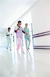 Nurses walking in hospital corridor