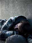 USA, Utah, Satl Lake City, homeless man sleeping in street