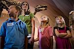 USA, Utah, Lehi, teacher with children (6-9) at museum