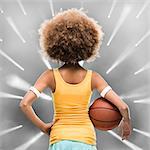 female basketball player with an afro