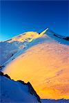 Europe, France, Haute Savoie, Rhone Alps, Chamonix Valley, Mont Blanc 4810m, climbers on Mt Blanc, sunrise