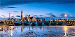 Italy, Veneto, Venice. High tide coming to Riva degli Schiavoni at dawn