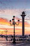 Italy, Veneto, Venice. Sunrise over Piazzetta San Marco and St Marks Lion