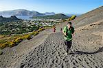 Hikers on the way to the Gran craters, Vulcano Island, Aeolian, or Aeolian Islands, Sicily, Italy, Europe, MR