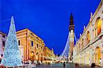 Europe, Italy, Veneto, Vicenza, Christmas decorations in Piazza Signori, clock tower on the Basilica Palladiana, Unesco World Heritage Site