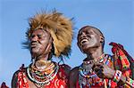 Africa, Kenya, Narok County, Masai Mara. Masai men dressed in traditional attire