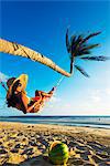 South East Asia, Philippines, The Visayas, Cebu, Bantayan Island, Sugar Beach, girl relaxing on the beach (MR)