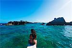 South East Asia, Philippines, The Visayas, Cebu, Malapascua island, girl aboard a catamaran,