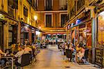 Tourists seated in outdoor restaurants and bars in Calle Barcelona, Madrid, Comunidad de Madrid, Spain