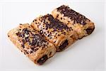 Closeup of a pain au chocolat or napolitana. Isolated on a white background