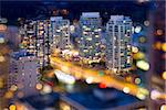 Vancouver British Columbia Cityscape with Blurred Defocused City Lights During Evening Blue Hour