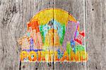 Portland Oregon Outline Silhouette with City Skyline Downtown Circle Color Text on Wood Background Impressionist Illustration