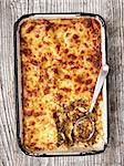 close up of a tray of rustic italian baked lasagna