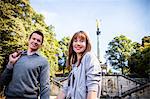 Young couple holding hands, Angel of Peace Monument, Munich, Bavaria, Germany