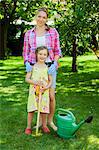 Mother and daughter in the garden, Munich, Bavaria, Germany