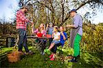 Multi-generation family peeling apples, Munich, Bavaria, Germany