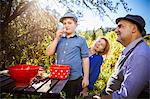 Boy eating an apple in garden, Munich, Bavaria, Germany