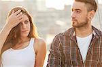 Portrait of young couple outdoors