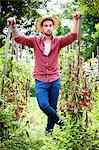 Portrait of young man in vegetable garden