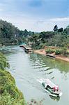 A boat on the River Kwai with the POW-built Wampoo Viaduct behind, Death Railway near Nam Tok, Kanchanaburi, Thailand, Southeast Asia, Asia