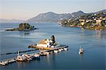 View to the Monastery of Panagia Vlacherna, small boat approaching, Kanoni, Corfu Town, Corfu, Ionian Islands, Greek Islands, Greece, Europe