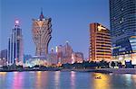 Grand Lisboa and Wynn Hotel and Casino at dusk, Macau, China, Asia