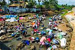 Women washing clothes in a river bed, City of Sao Tome, Sao Tome and Principe, Atlantic Ocean, Africa