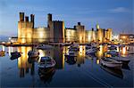 Caernarfon Castle, UNESCO World Heritage Site, on the River Seiont, Caernarfon, Snowdonia, Gwynedd, Wales, United Kingdom, Europe