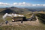 Snowdon Mountain Railway train and the Llanberis path, Snowdon, Snowdonia National Park, Gwynedd, Wales; United Kingdom, Europe