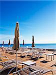 Sunbeds and Closed Sunshades on Deck at Hotel, Cala Ratjada, Majorca, Balearic Islands, Spain