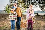 Children carrying picnic basket