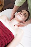 Young woman receiving Shiatsu treatment