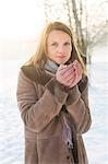 Young woman in warm clothing in winter