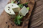 Close-up of cheese and lettuce leaf, Germany