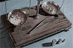 High angle view of silvers with copper on scales in workshop, Bavaria, Germany