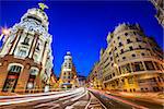 Madrid, Spain cityscape on Gran Via at twilight.