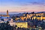 Malaga, Spain cityscape at the Cathedral, City Hall and Alcazaba citadel of Malaga.