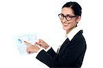 Female executive holding corporate documents