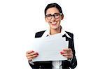 Happy business executive with important documents